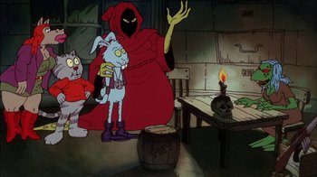 Movie still from “Fritz the Cat” (1972), directed by Ralph Bakshi – A group of cartoon characters sitting around a table; Wide shot, Over the shoulder angle