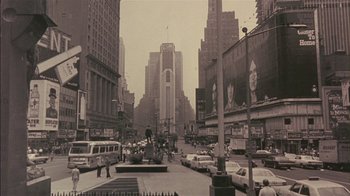 Movie still from “Fritz the Cat” (1972), directed by Ralph Bakshi – An old photo of a busy street in a large city; Extreme Wide shot, High angle