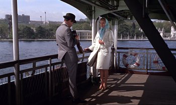 Movie still from “From Russia with Love” (1963), directed by Terence Young – A man and a woman standing on a deck of a boat; Wide shot, Over the shoulder angle