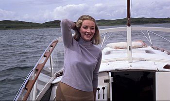 Movie still from “From Russia with Love” (1963), directed by Terence Young – A young woman standing on the bow of a boat; Medium shot, Low angle