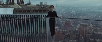 Movie still from “The Walk” (2015), directed by Robert Zemeckis – A man standing on the edge of a tall building; Wide shot, Low angle