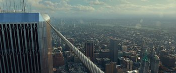 Movie still from “The Walk” (2015), directed by Robert Zemeckis – A view of a large city from a helicopter; Extreme Wide shot, High angle