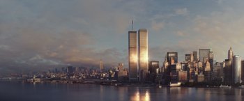 Movie still from “The Walk” (2015), directed by Robert Zemeckis – A view of the twin towers of the world trade center in new york city; Extreme Wide shot, Low angle