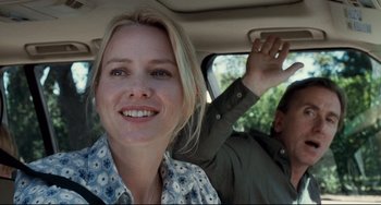 Movie still from “Funny Games” (2007), directed by Michael Haneke – Two people in the back seat of a car; Close Up shot, Over the shoulder angle
