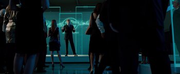 Movie still from “G-Force” (2009), directed by Hoyt Yeatman – A group of people standing in front of a screen; Wide shot, Low angle