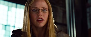 Movie still from “G-Force” (2009), directed by Hoyt Yeatman – A person wearing glasses and a leather jacket; Close Up shot, Low angle