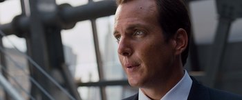Movie still from “G-Force” (2009), directed by Hoyt Yeatman – A person wearing a suit and tie; Close Up shot, Low angle