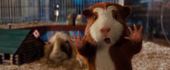 Movie still from “G-Force” (2009), directed by Hoyt Yeatman – A guinea pig with its hand up; Close Up shot, Low angle