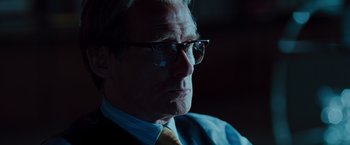 Movie still from “G-Force” (2009), directed by Hoyt Yeatman – An older man wearing glasses and a tie; Close Up shot, Low angle