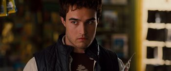 Movie still from “G-Force” (2009), directed by Hoyt Yeatman – A person wearing a jacket; Close Up shot, Over the shoulder angle