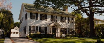 Movie still from “G-Force” (2009), directed by Hoyt Yeatman – A large white house with black shutters on the outside; Extreme Wide shot, High angle