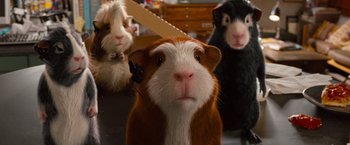 Movie still from “G-Force” (2009), directed by Hoyt Yeatman – A group of animals that are standing in a room together; Close Up shot, Low angle