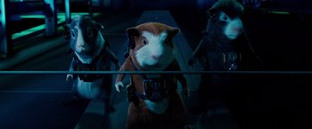 Movie still from “G-Force” (2009), directed by Hoyt Yeatman – A group of mice standing next to each other in a room; Medium shot, Low angle