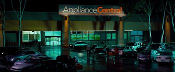 Movie still from “G-Force” (2009), directed by Hoyt Yeatman – A group of people standing in front of an appliance store; Extreme Wide shot, High angle