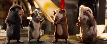 Movie still from “G-Force” (2009), directed by Hoyt Yeatman – A couple of mice standing next to each other on the floor; Medium shot, Low angle