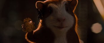 Movie still from “G-Force” (2009), directed by Hoyt Yeatman – A hamster's face with a person in the background; Extreme Close Up shot, Low angle