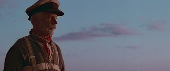 Movie still from “Gallipoli” (1981), directed by Peter Weir – An old man with a beard wearing a hat; Close Up shot, Low angle