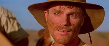 Movie still from “Gallipoli” (1981), directed by Peter Weir – A person wearing a hat; Close Up shot, Low angle