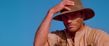 Movie still from “Gallipoli” (1981), directed by Peter Weir – A person wearing a hat; Close Up shot, Low angle