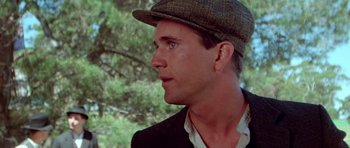 Movie still from “Gallipoli” (1981), directed by Peter Weir – A person wearing a hat; Close Up shot, Over the shoulder angle