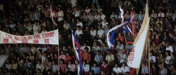Movie still from “Game of Death” (1978), directed by Robert Clouse – A crowd of people sitting and standing in a stadium; Extreme Wide shot, High angle