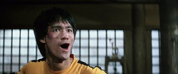 Movie still from “Game of Death” (1978), directed by Robert Clouse – A man with a surprised look on his face; Close Up shot, Low angle