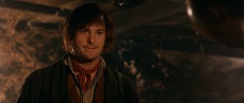 Movie still from “Gangs of New York” (2002), directed by Martin Scorsese – A person with long hair; Close Up shot, Over the shoulder angle