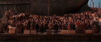 Movie still from “Gangs of New York” (2002), directed by Martin Scorsese – A crowd of people standing on top of a platform; Extreme Wide shot, High angle