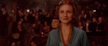 Movie still from “Gangs of New York” (2002), directed by Martin Scorsese – A person smiling at the camera; Close Up shot, Low angle
