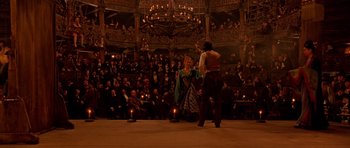 Movie still from “Gangs of New York” (2002), directed by Martin Scorsese – A couple of people standing in front of a large crowd; Wide shot, High angle