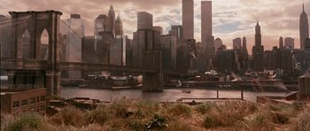 Movie still from “Gangs of New York” (2002), directed by Martin Scorsese – A view of a city skyline from across a river; Extreme Wide shot, High angle