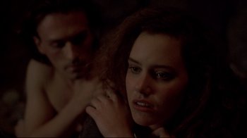 Movie still from “Gas Food Lodging” (1992), directed by Allison Anders – A man and a woman in a dark room; Close Up shot, Over the shoulder angle