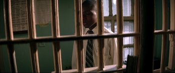 Movie still from “George Washington” (2000), directed by David Gordon Green – A young man in a jail cell looking out the window; Close Up shot, High angle