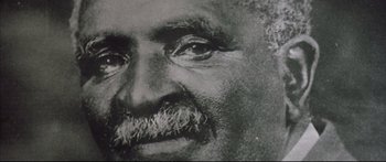 Movie still from “George Washington” (2000), directed by David Gordon Green – A man's eyes and mustache; Extreme Close Up shot, High angle