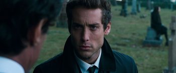 Movie still from “Get Carter” (2000), directed by Stephen Kay – A person wearing a suit and tie; Close Up shot, Low angle