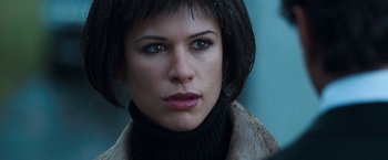 Movie still from “Get Carter” (2000), directed by Stephen Kay – A person wearing a jacket; Close Up shot, Over the shoulder angle