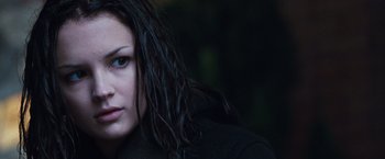 Movie still from “Get Carter” (2000), directed by Stephen Kay – A person with long black hair; Close Up shot, Over the shoulder angle