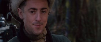 Movie still from “Get Carter” (2000), directed by Stephen Kay – A person wearing a hat; Close Up shot, Over the shoulder angle