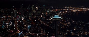 Movie still from “Get Carter” (2000), directed by Stephen Kay – A view of a city at night from a helicopter; Extreme Wide shot, High angle