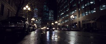 Movie still from “Get Carter” (2000), directed by Stephen Kay – A city street at night lit by street lights; Extreme Wide shot, High angle