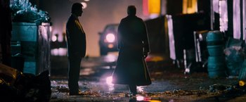 Movie still from “Get Carter” (2000), directed by Stephen Kay – Two men are standing on the street at night; Wide shot, Low angle
