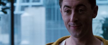 Movie still from “Get Carter” (2000), directed by Stephen Kay – A man's face in front of a building; Close Up shot, Over the shoulder angle