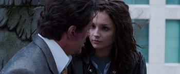 Movie still from “Get Carter” (2000), directed by Stephen Kay – A man and a woman face to face in front of each other; Close Up shot, Over the shoulder angle