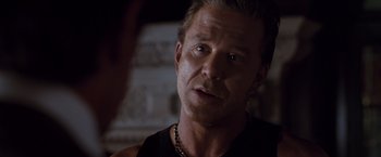 Movie still from “Get Carter” (2000), directed by Stephen Kay – A person wearing a black shirt; Close Up shot, Over the shoulder angle