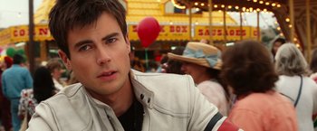 Movie still from “Ghost Rider” (2007), directed by Mark Steven Johnson – A person wearing a jacket; Close Up shot, Over the shoulder angle