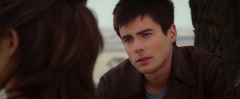 Movie still from “Ghost Rider” (2007), directed by Mark Steven Johnson – A young man looking at a young woman in front of a desert landscape; Close Up shot, Over the shoulder angle