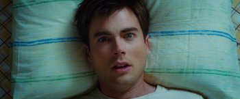 Movie still from “Ghost Rider” (2007), directed by Mark Steven Johnson – A person laying in a bed; Close Up shot, Overhead angle