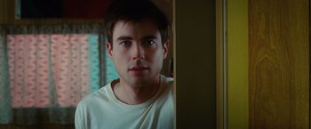 Movie still from “Ghost Rider” (2007), directed by Mark Steven Johnson – A person looking at the camera; Close Up shot, Over the shoulder angle
