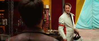 Movie still from “Ghost Rider” (2007), directed by Mark Steven Johnson – A man standing in front of a mirror looking at himself in the mirror; Medium shot, Over the shoulder angle