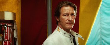 Movie still from “Ghost Rider” (2007), directed by Mark Steven Johnson – A person wearing a uniform; Close Up shot, Low angle